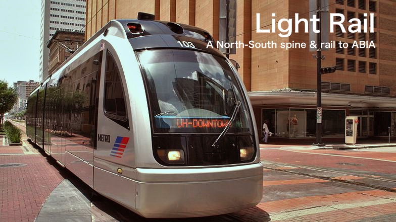 A silver light rail vehicle awaits passengers. It's sign reads 'Downtown'. Image text reads: Light Rail - A north-south spine & a connection to the ABIA